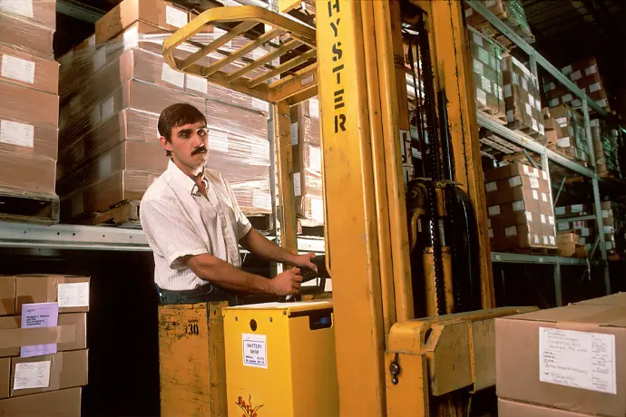 A forklift in a warehouse