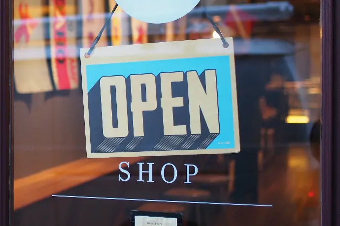 An Open sign in a shop window